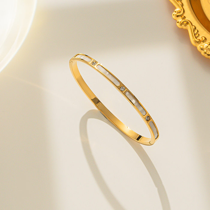 Bracelet plaqué or avec incrustation de strass en acier titane de couleur unie de style simple