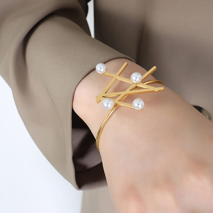 Bague de bracelet plaquée or en acier titane avec perles géométriques de style à la mode