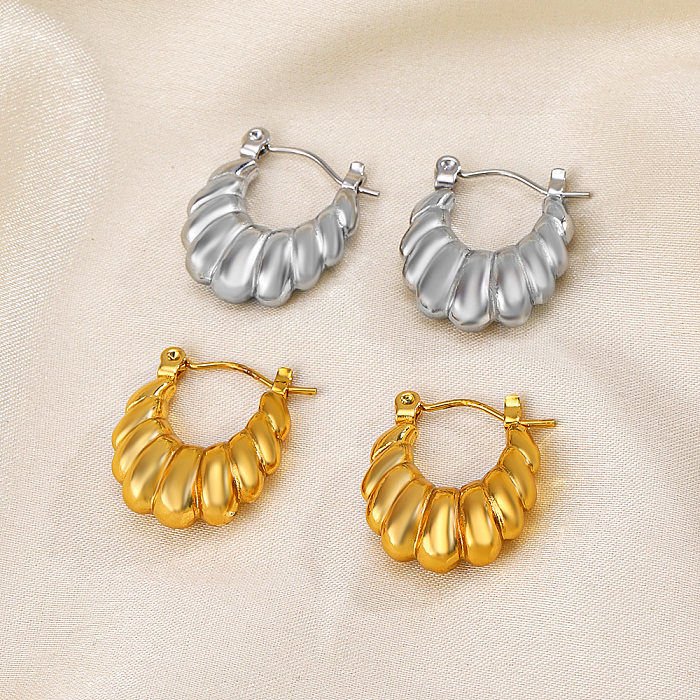 1 par de pendientes chapados en oro de acero inoxidable con forma de U