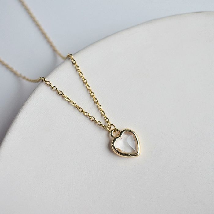 Collar con colgante de diamantes de imitación con incrustaciones de acero inoxidable en forma de corazón de estilo simple