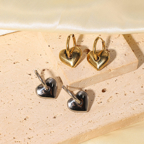 Boucles d'oreilles en acier inoxydable avec pendentif en forme de cœur massif européen et américain