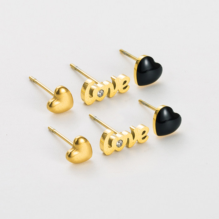 1 conjunto de brincos de orelha redondos de aço inoxidável em forma de coração com letras da moda