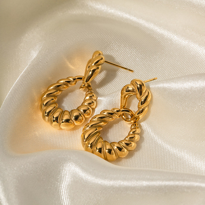 1 paire de boucles d'oreilles pendantes en acier inoxydable plaqué or 18 carats avec rayures en spirale