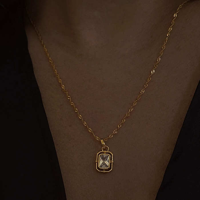 Collier pendentif plaqué or 18 carats avec incrustation de placage en acier inoxydable géométrique rétro