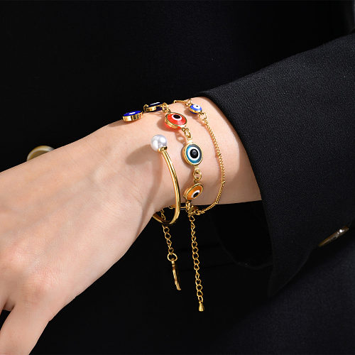 Bracelets en acrylique plaqué or 18 carats en acier inoxydable, Style ethnique, œil du diable, vente en gros