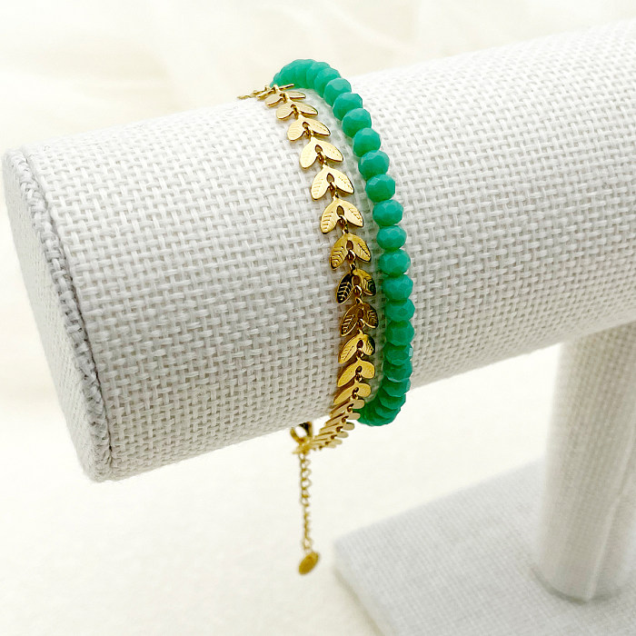 Lady Leaves-Armbänder aus Edelstahl mit Perlenbeschichtung und 14-Karat-Vergoldung
