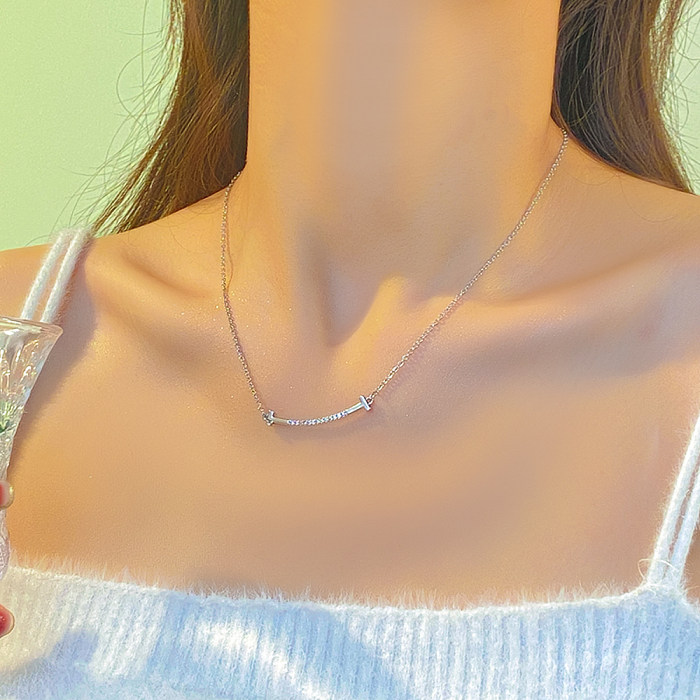 Schlichte Halskette „Smile“ aus Edelstahl mit Kupferbeschichtung und Inlay-Zirkon-Versilberung
