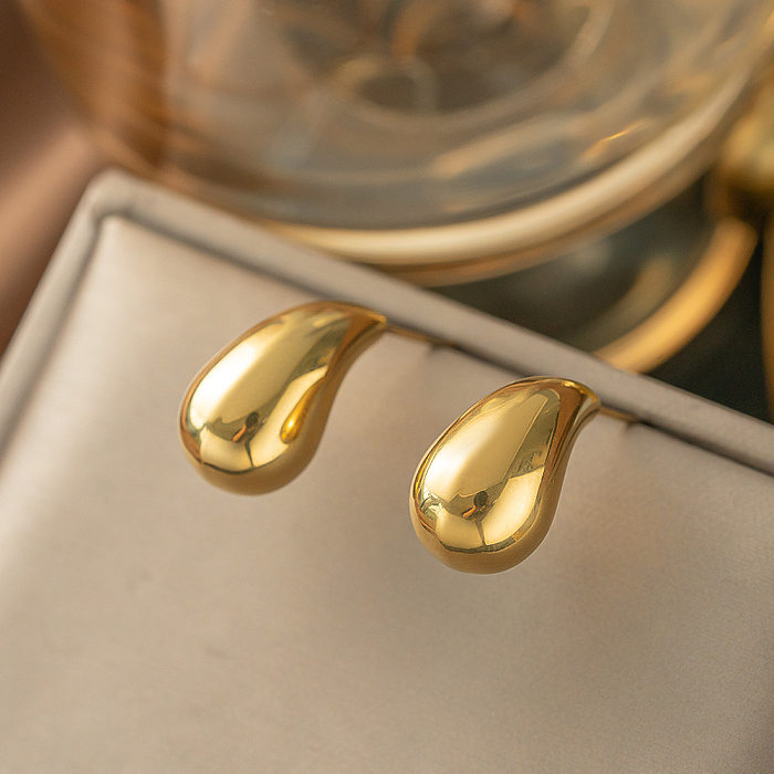 1 Paar schlichte, einfarbige Ohrstecker aus Edelstahl mit 18-Karat-Vergoldung