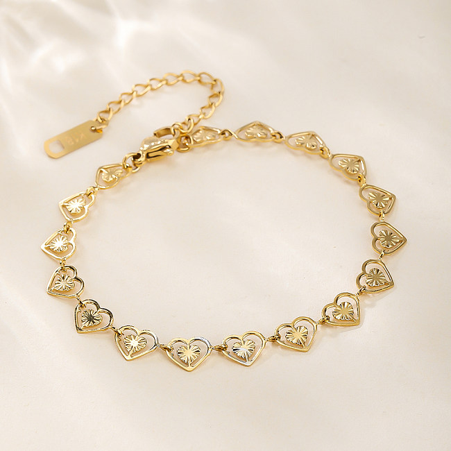Atacado estilo IG estilo simples formato de coração aço inoxidável titânio banhado a ouro 18K pulseiras de aço titânio banhado a ouro