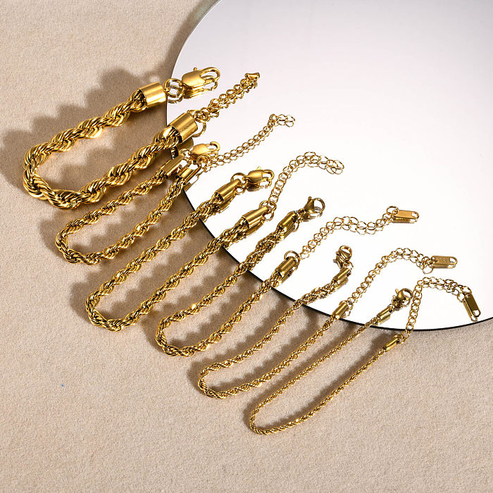 Pulseras chapadas en oro de 18 quilates con revestimiento de acero inoxidable de color sólido de estilo clásico