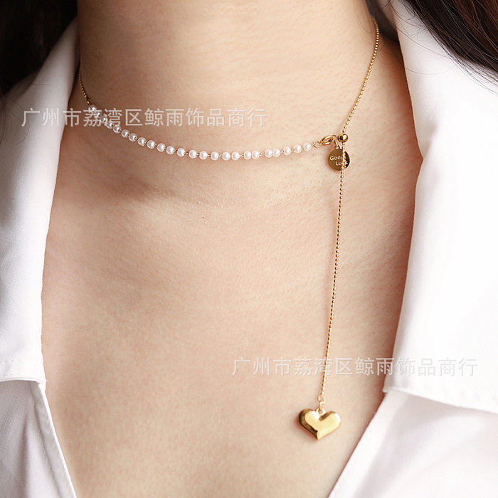 Collier coréen en acier inoxydable avec perles et pompon long en forme de cœur