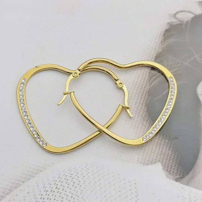 1 par de brincos de argola de diamante artificial de aço inoxidável em formato de coração estilo moderno