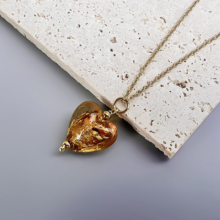 Collier pendentif rétro en forme de cœur en acier inoxydable et placage de verre