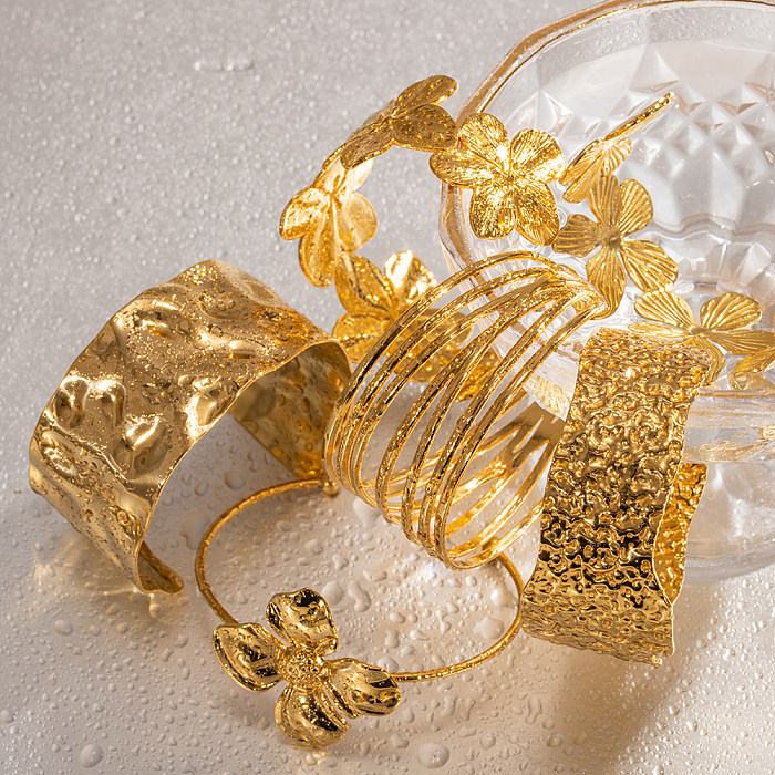 Pulseira banhada a ouro 18K de aço inoxidável elegante flor geométrica a granel
