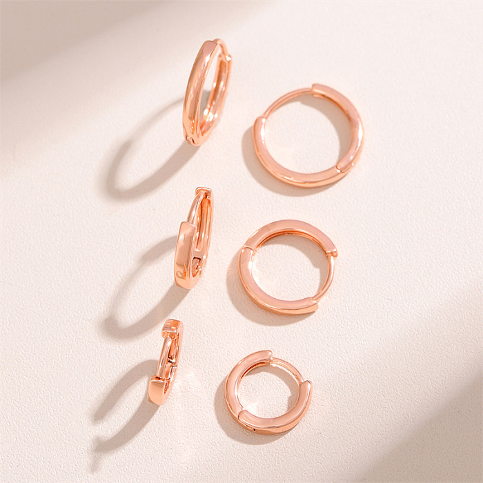 1 par de pinos de orelha banhados a ouro rosa, estilo retrô simples, redondo, aço inoxidável