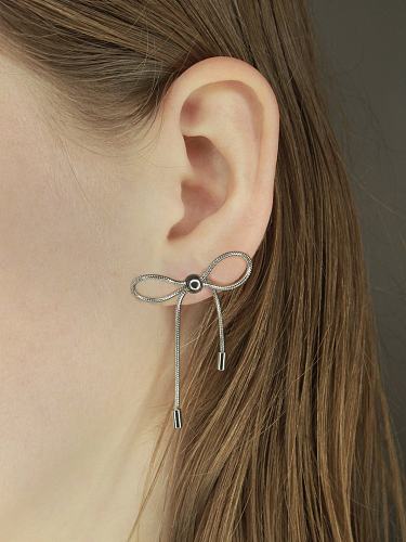 1 par de brincos de orelha de aço inoxidável estilo moderno casual com laço