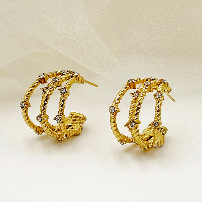 1 par de pinos de orelha banhados a ouro, estilo vintage, estilo simples, estilo romano, formato c, em camadas, incrustação de aço inoxidável, zircônia