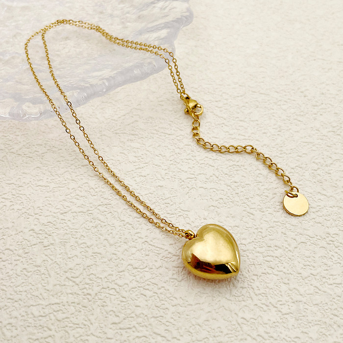 Collar con colgante chapado en oro de circón con incrustaciones de acero inoxidable con forma de corazón lujoso de estilo vintage