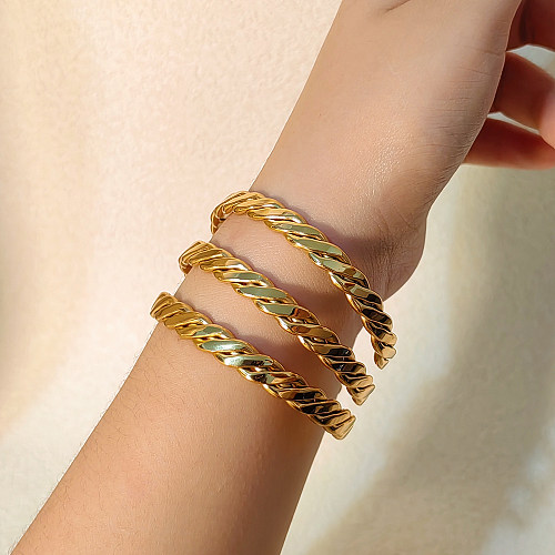 Estilo vintage estilo simples estilo clássico cor sólida espiral listra torção trança de aço inoxidável banhado a ouro 18k pulseira