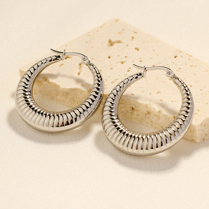 1 paire de boucles d'oreilles rétro en acier inoxydable plaqué or 18 carats avec placage géométrique