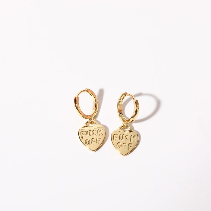 1 paire de boucles d'oreilles en acier inoxydable plaqué or 18 carats, style streetwear simple, lettre en forme de cœur