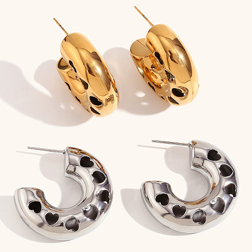 1 paire de boucles d'oreilles plaquées or 18 carats en acier inoxydable en forme de cœur de style simple