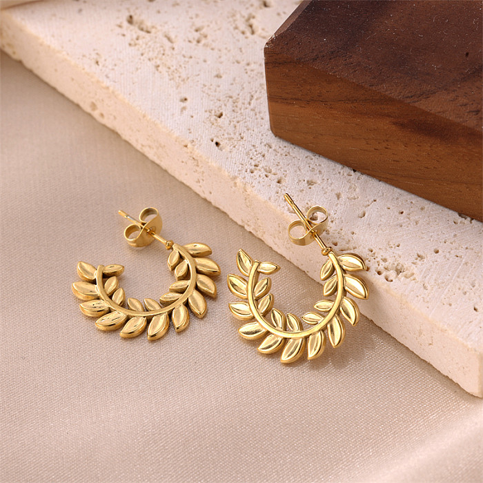 1 paire de boucles d'oreilles plaquées or 18 carats en acier inoxydable plaqué feuilles de style coréen