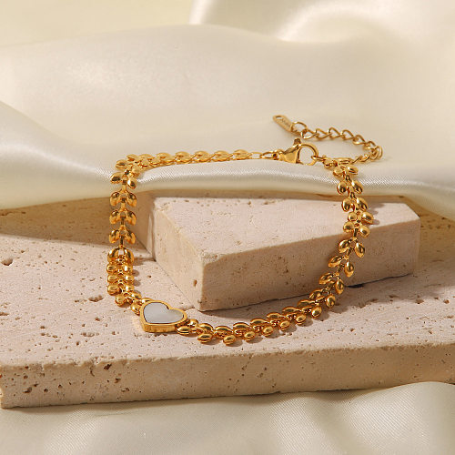 Pulseiras de concha banhadas a ouro de aço inoxidável em formato de coração da moda