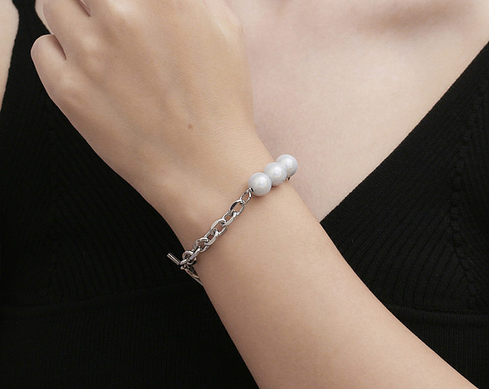 Pulseras de perlas de acero titanio con forma de corazón estilo fresco estilo IG
