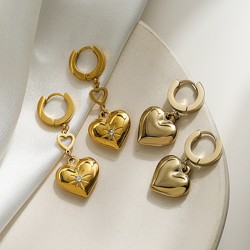 1 par de pendientes colgantes chapados en oro de 18K con incrustaciones de circonita de acero inoxidable con forma de corazón de viaje de estilo Simple