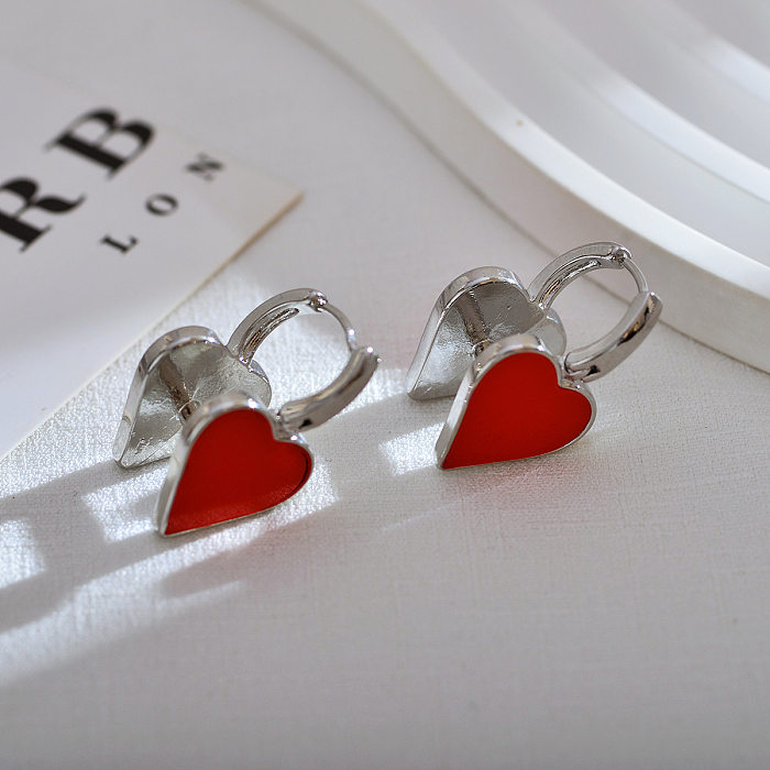 1 par de brincos de aço inoxidável esmaltados em forma de coração estilo simples