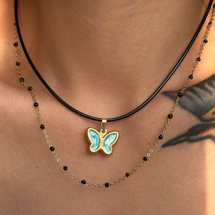 Collier pendentif papillon en acier inoxydable et émail de style classique