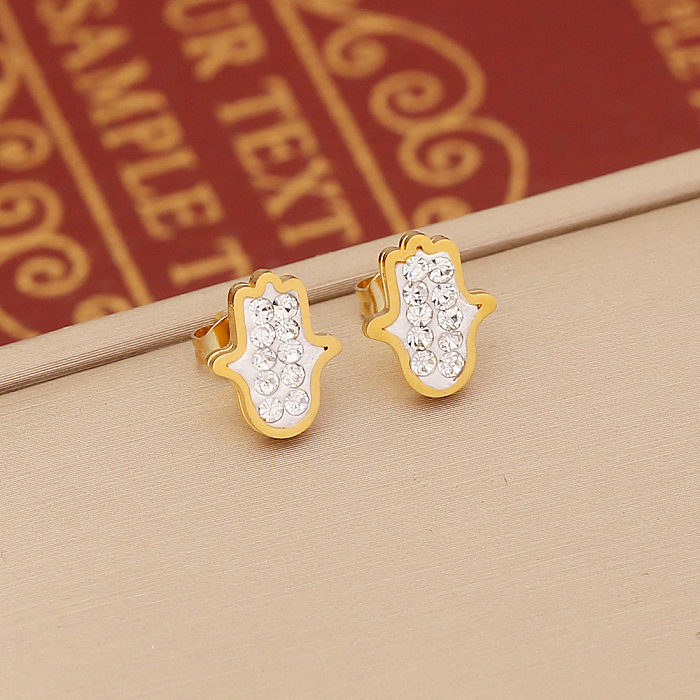 Pendientes de diamantes de imitación chapados en acero inoxidable con mariposa en forma de corazón a la moda, 1 par