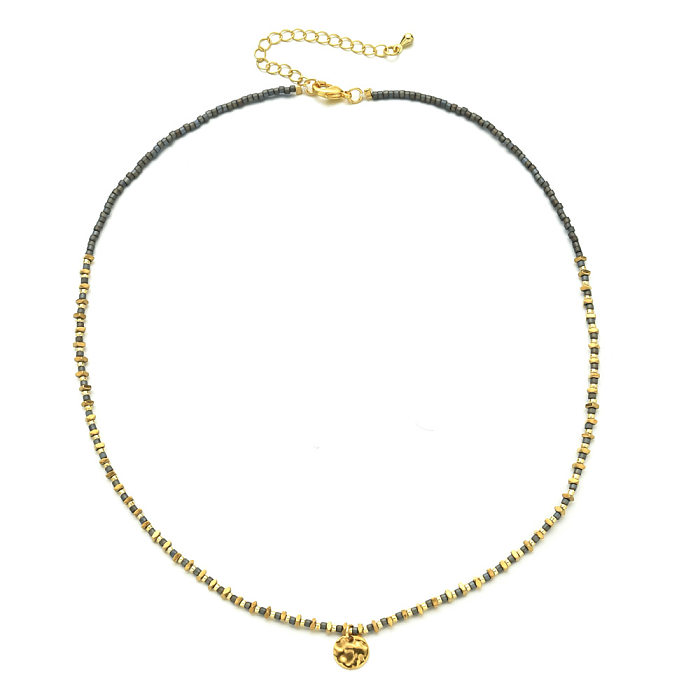 Lässige Halskette mit geometrischem Anhänger aus Edelstahl-Rocailles mit unregelmäßiger Beschichtung