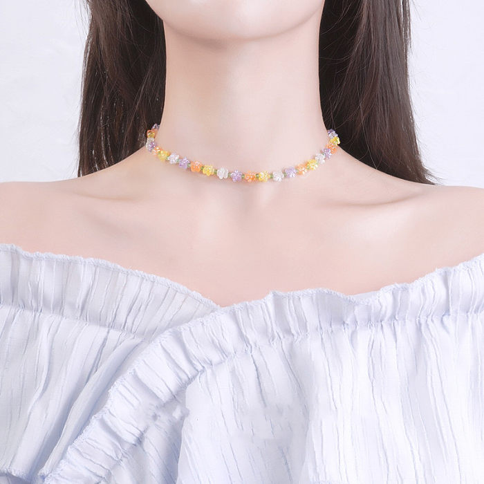 Lässige, schlichte Halskette mit Blumen- und Schleife-Knoten-Edelstahlüberzug und Inlay-Zirkon-Halskette