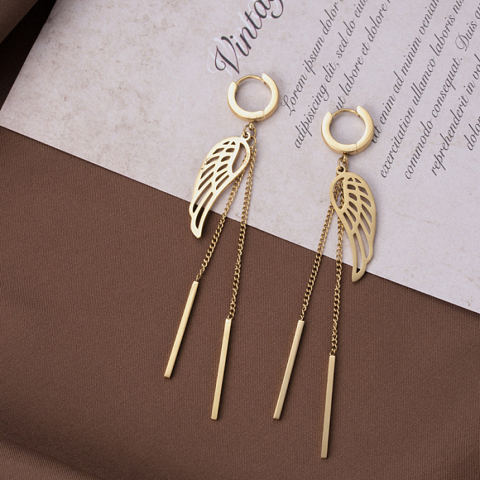 1 par de pendientes colgantes chapados en oro de 18K de acero inoxidable chapados en forma de corazón atrapasueños cruzados de estilo Simple y elegante