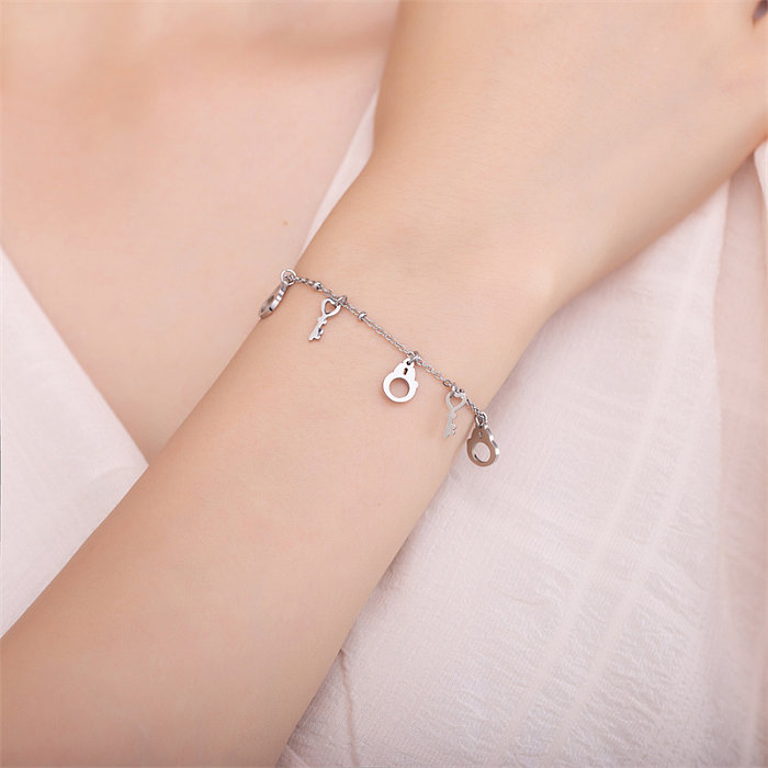 Casual Simple Style Classic Style Triangle Heart Shape Key Stainless Steel Titanium Steel Polishing Inlay Zircon Bracelets