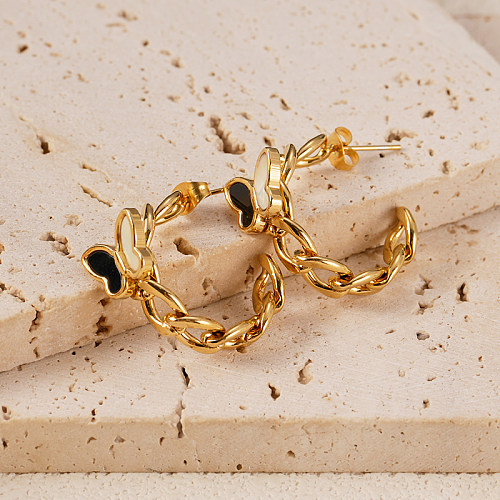 1 par de brincos de orelha banhados a ouro de aço inoxidável estilo simples borboleta