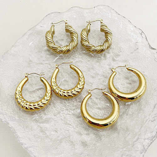 1 par de brincos banhados a ouro de aço inoxidável estilo moderno streetwear em formato de U