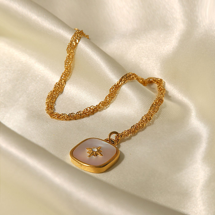 Collier avec pendentif en forme de coquillage plaqué or en acier inoxydable Fashion Star