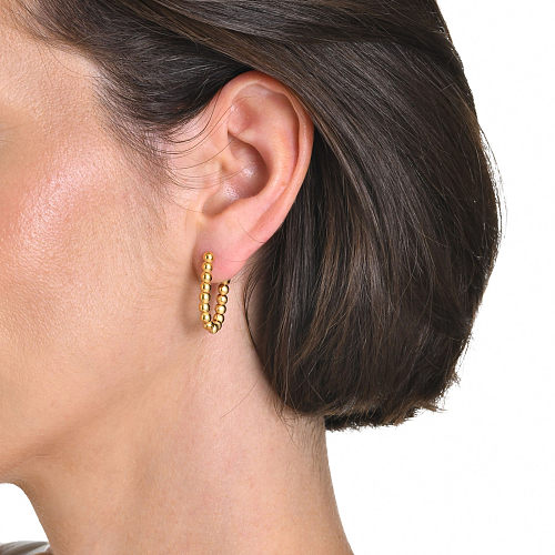1 paire de boucles d'oreilles plaquées or 18 carats en acier inoxydable en forme de U de style simple IG