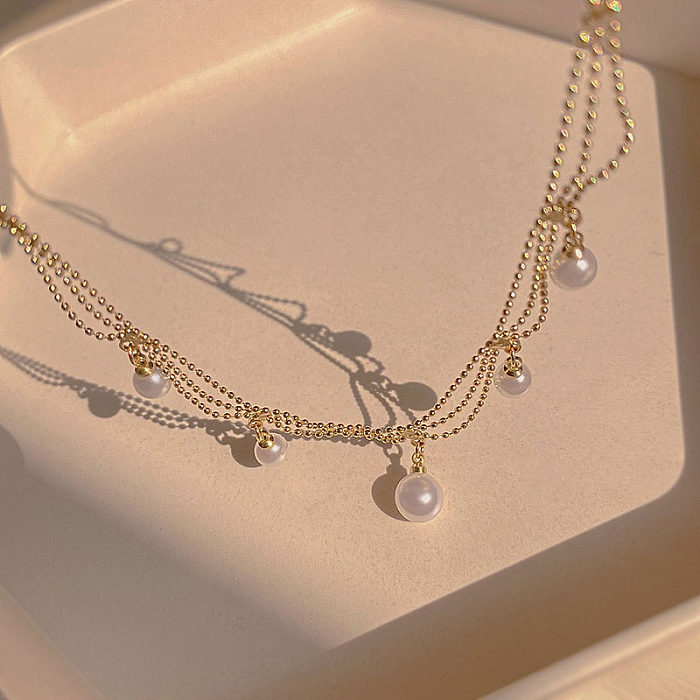 Collar con colgante de perlas artificiales con incrustaciones de acero inoxidable redondo de estilo simple estilo IG