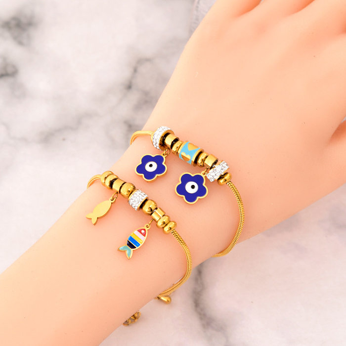 Damen-Armbänder mit herzförmiger Blume, Titan-Stahlbeschichtung, Intarsien aus künstlichen Edelsteinen