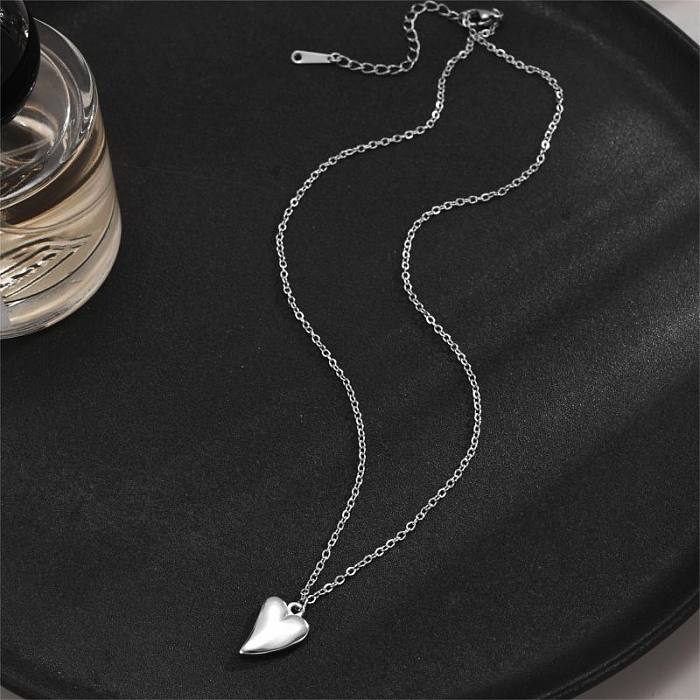Collier pendentif plaqué or 18 carats en acier inoxydable en forme de cœur élégant