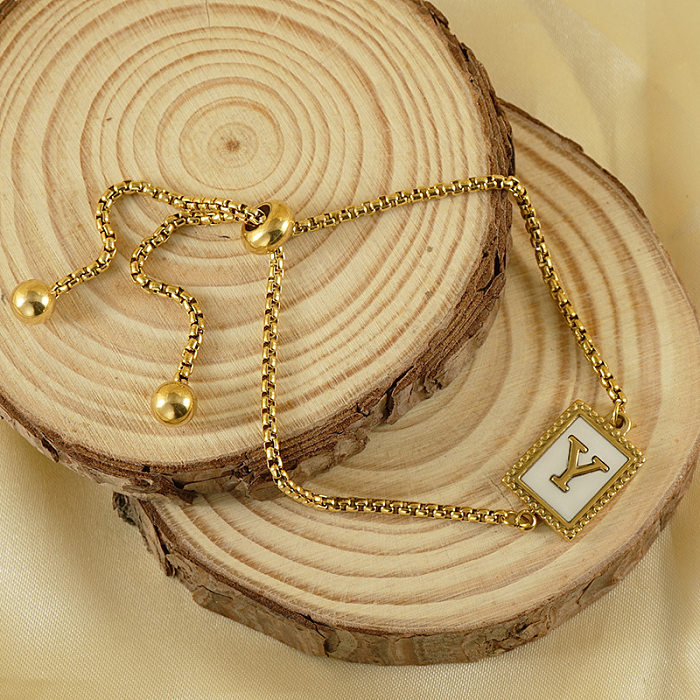 Bracelets de coquille avec incrustation de placage d'acier et de titane de lettre de mode 1 pièce