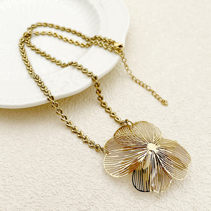 Collier pendentif plaqué or en acier inoxydable avec fleur de trajet de style romain