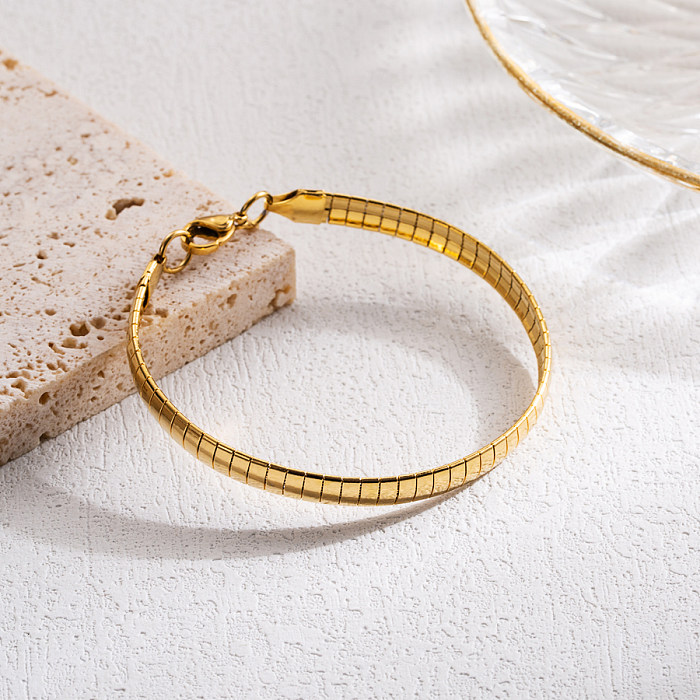 IG Style Armbänder im klassischen Gitterstil aus einfarbigem Edelstahl mit 18-Karat-Vergoldung