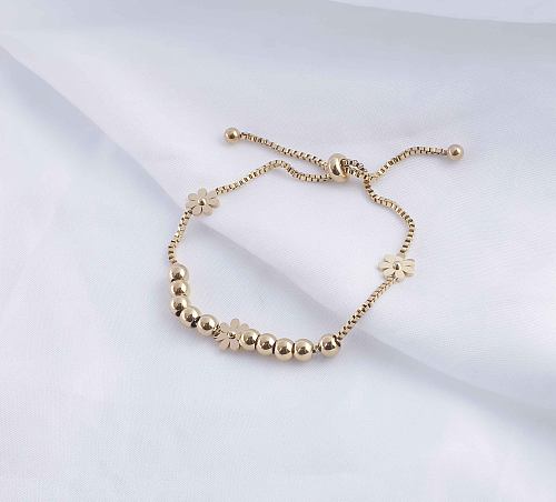 Retro-Klassiker-Stil, runde Blumen-Armbänder aus Titanstahl mit Perlenbeschichtung, vergoldet