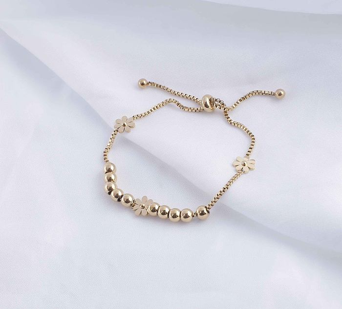 Retro-Klassiker-Stil, runde Blumen-Armbänder aus Titanstahl mit Perlenbeschichtung, vergoldet