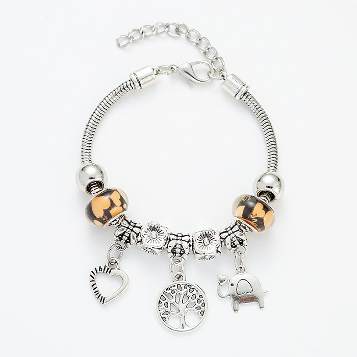 Bracelets de placage en acier titane d'éléphant de forme de coeur d'arbre de mode